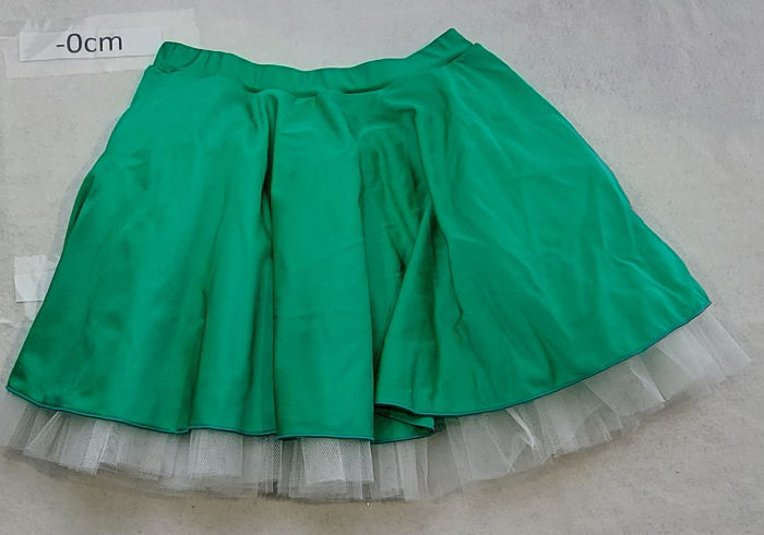 Green skirts with white netting
