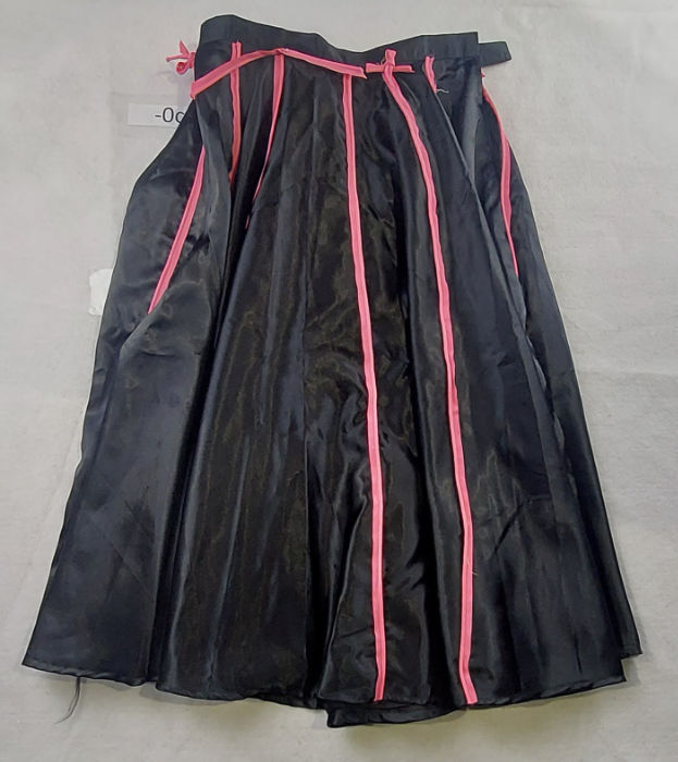 Black satin skirt with pink ribbon