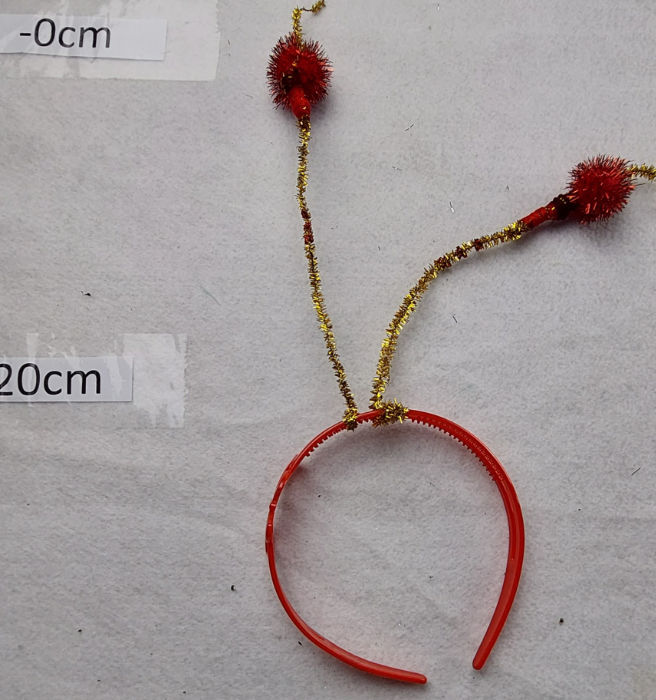HEADBAND WITH RED ANTENNAE